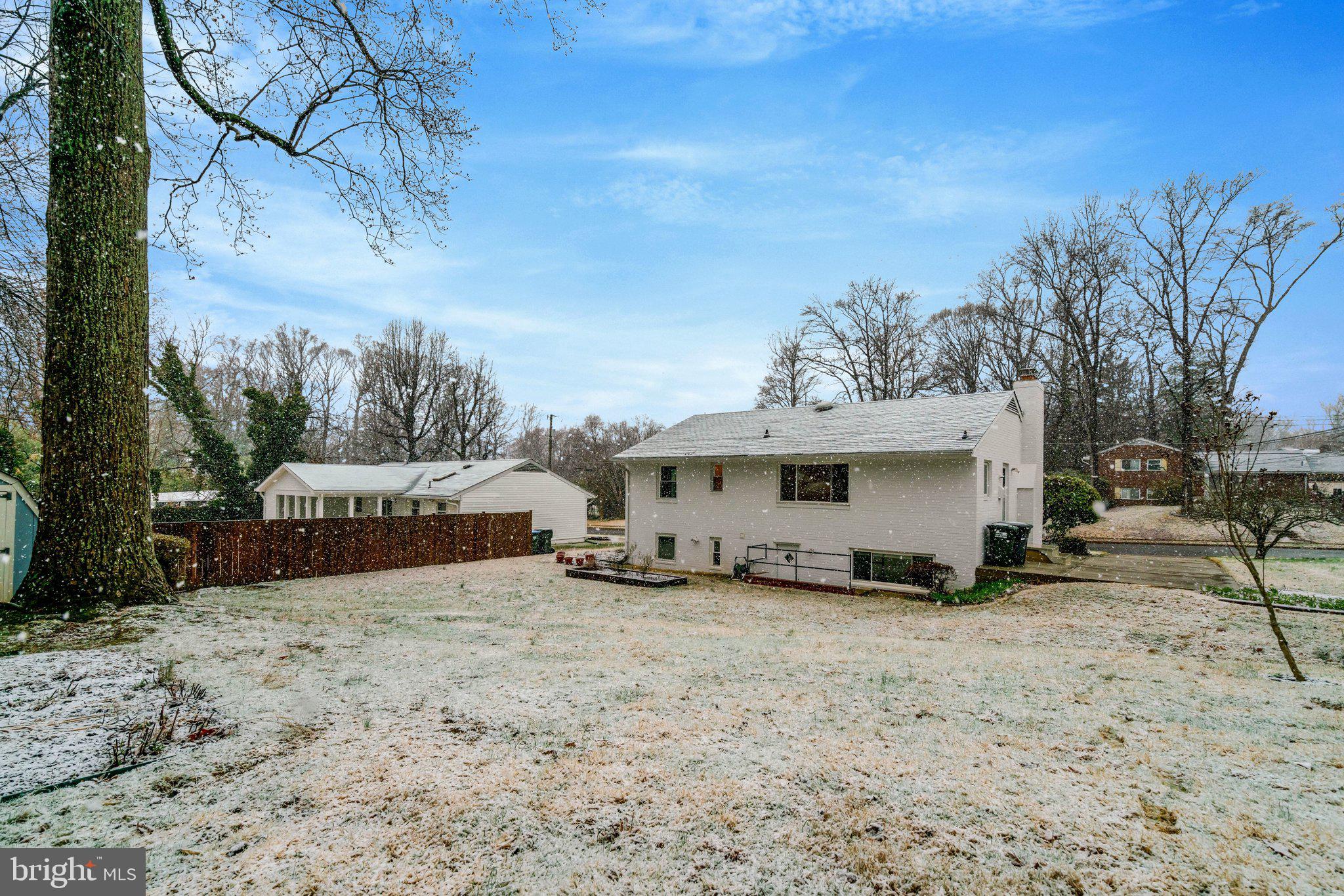 5417 Juliet Street Springfield, VA 22151 - Photo 43 of 46 a view of a house with a yard covered in snow
