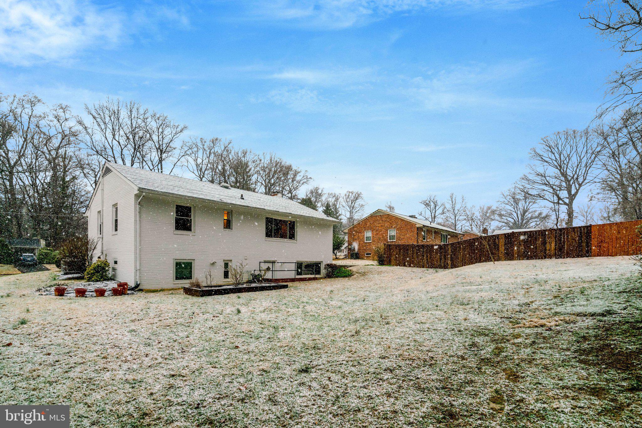 5417 Juliet Street Springfield, VA 22151 - Photo 45 of 46 a view of a white house with a yard