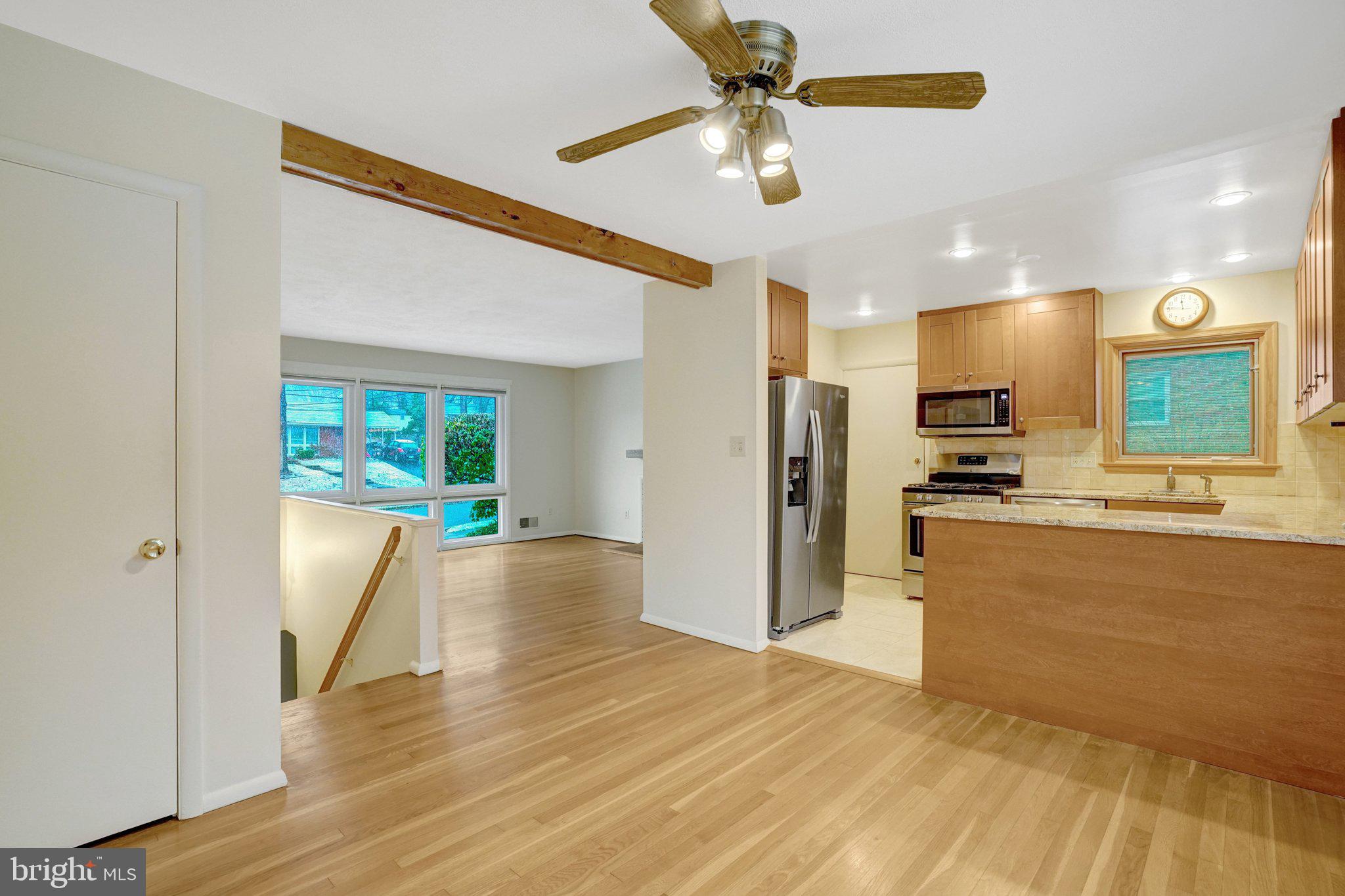 5417 Juliet Street Springfield, VA 22151 - Photo 10 of 46 a view of kitchen and hall with wooden floor