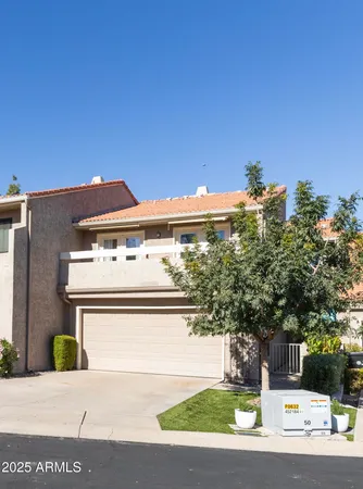 a house view with a garden space