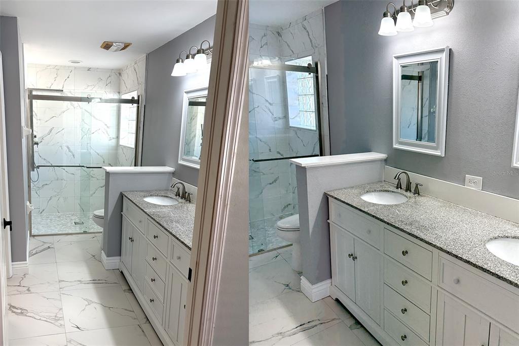 8520 Heyward Road Tampa, FL 33635 - Photo 7 of 12 a bathroom with a granite countertop sink a mirror and a bathtub