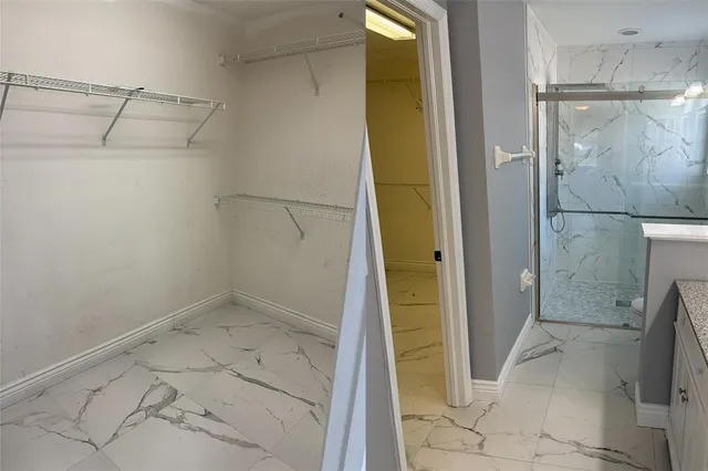 a view of a room with a window