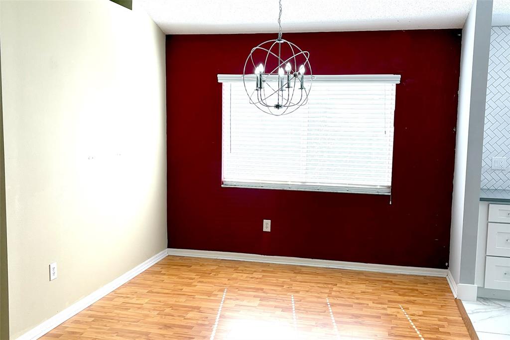 8520 Heyward Road Tampa, FL 33635 - Photo 9 of 12 a view of a room with a window