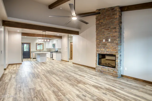 a view of a livingroom with a fireplace