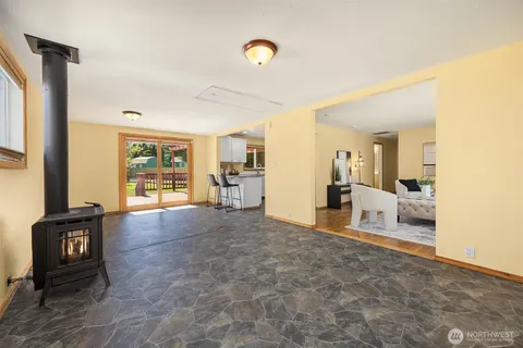 a view of a livingroom with furniture and front door