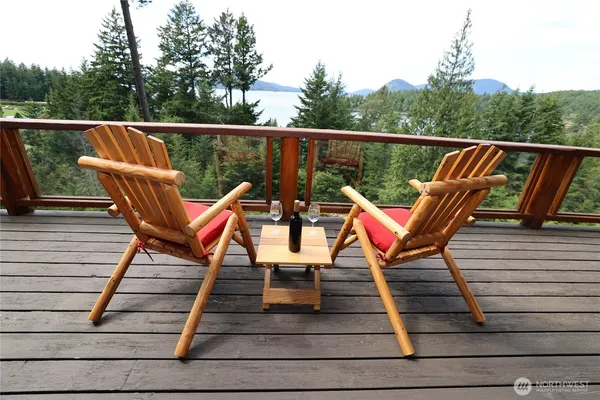 a view of sitting area with furniture and wooden deck