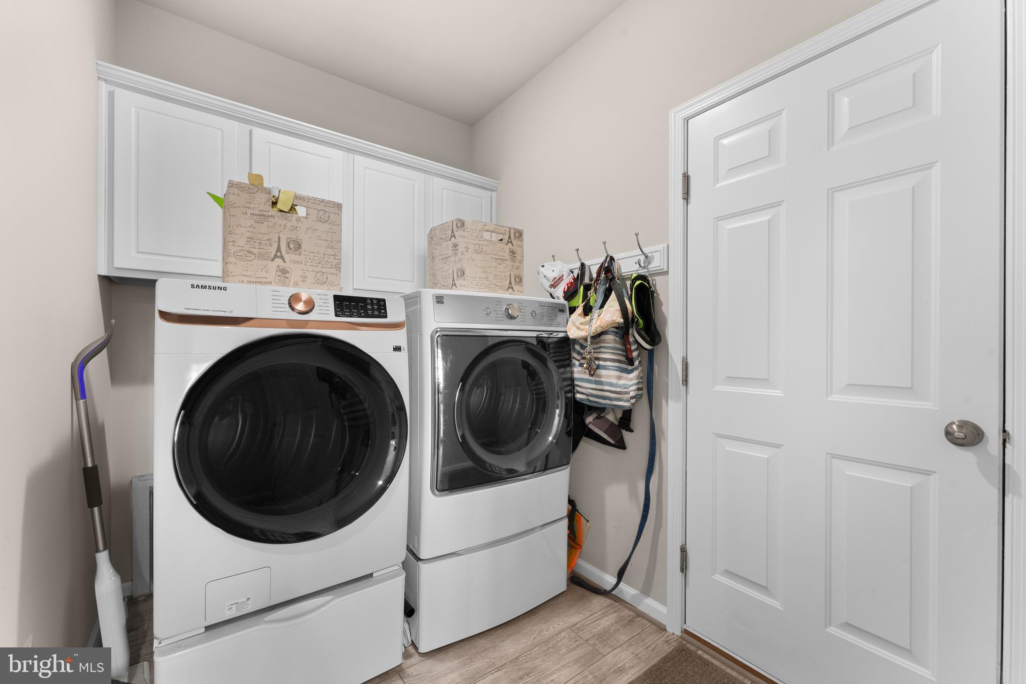 10541 Blazing Star Loop Bristow, VA 20136 - Photo 21 of 41 a utility room with dryer and washer