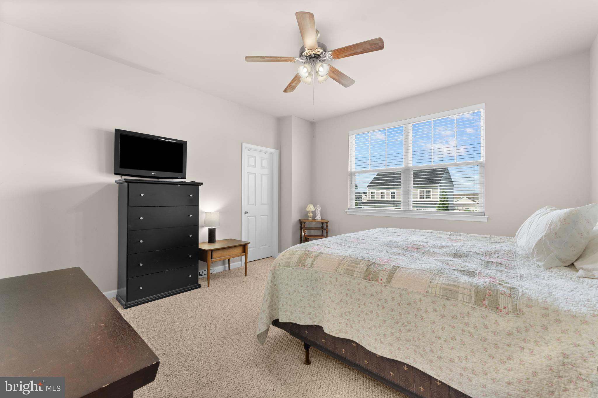 10541 Blazing Star Loop Bristow, VA 20136 - Photo 23 of 41 a bedroom with a bed and a television