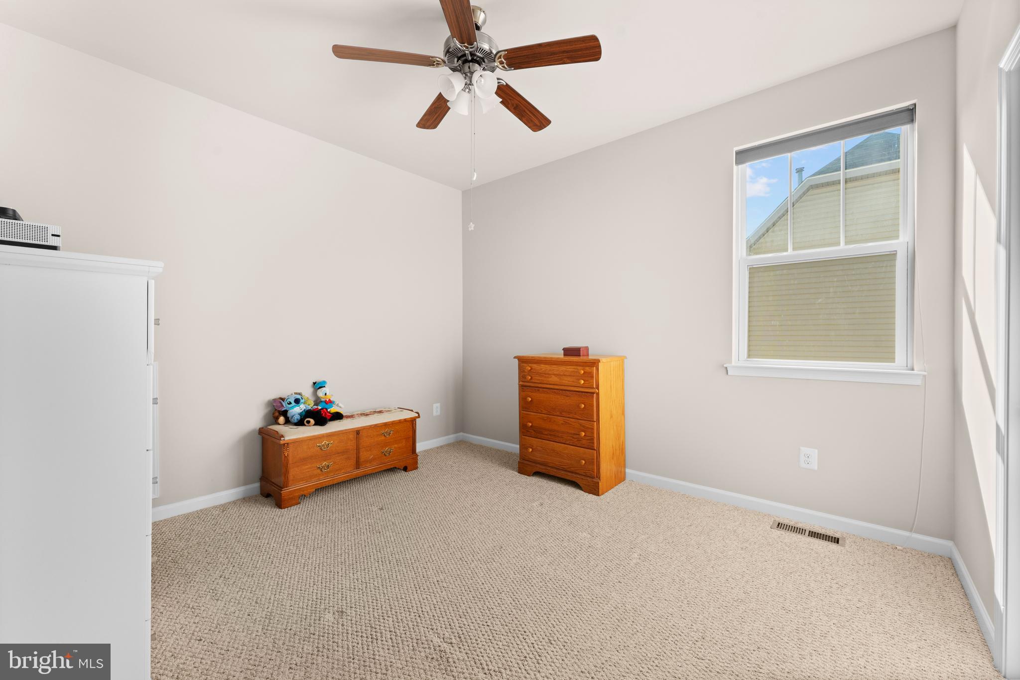 10541 Blazing Star Loop Bristow, VA 20136 - Photo 25 of 41 a room with furniture and window