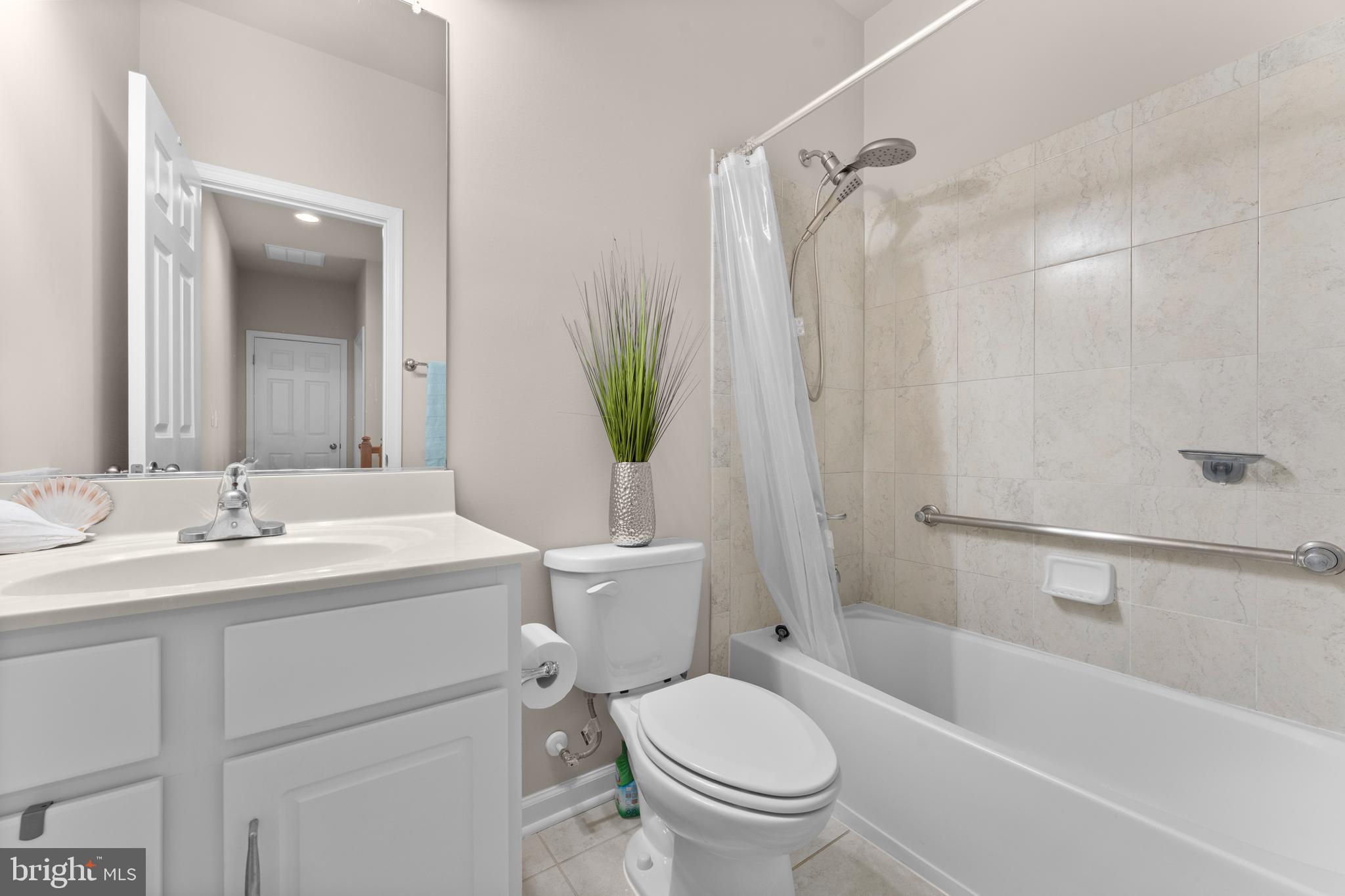 10541 Blazing Star Loop Bristow, VA 20136 - Photo 27 of 41 a bathroom with a sink toilet and shower