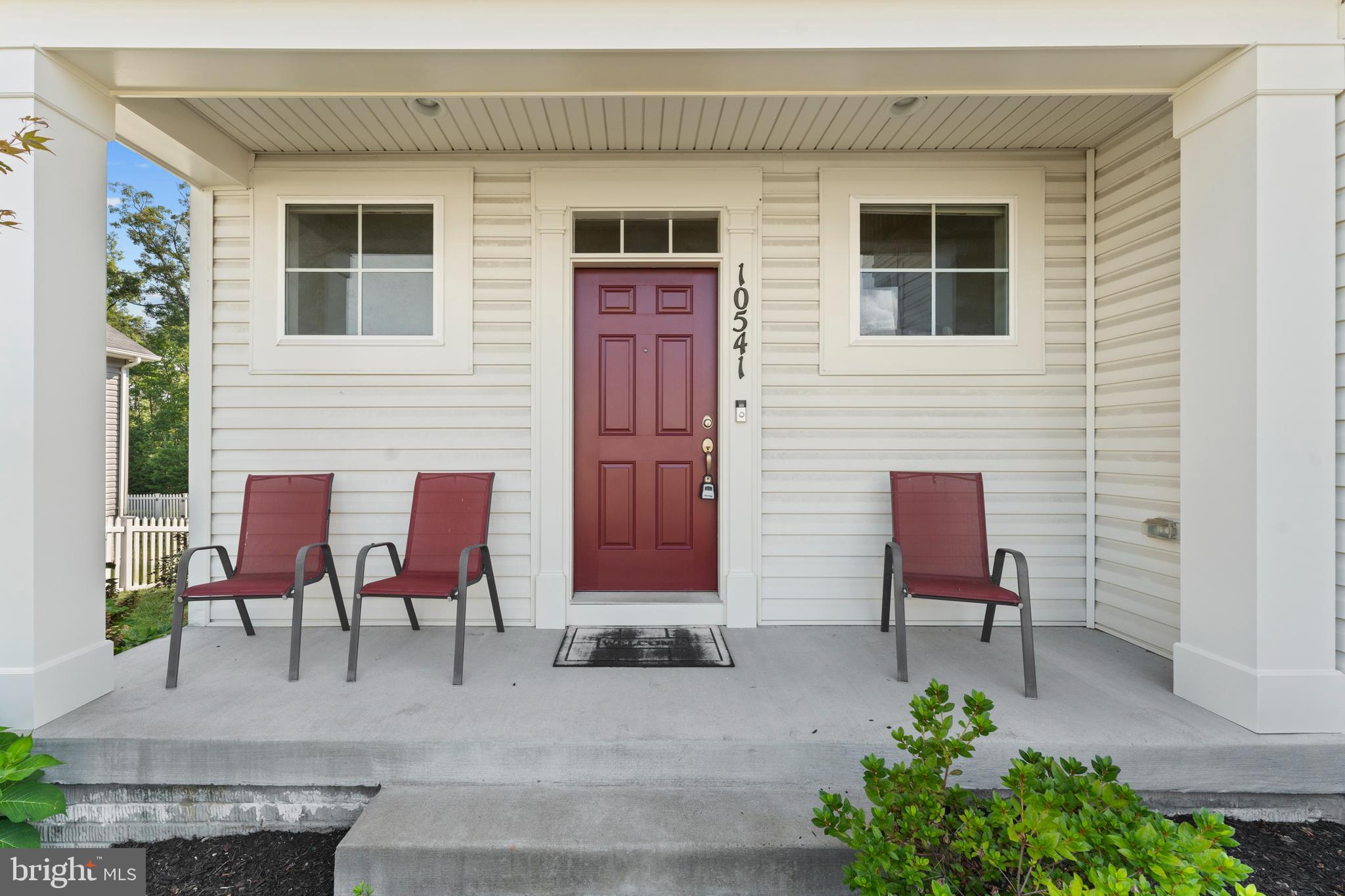 10541 Blazing Star Loop Bristow, VA 20136 - Photo 3 of 41 a view of two chairs in a patio