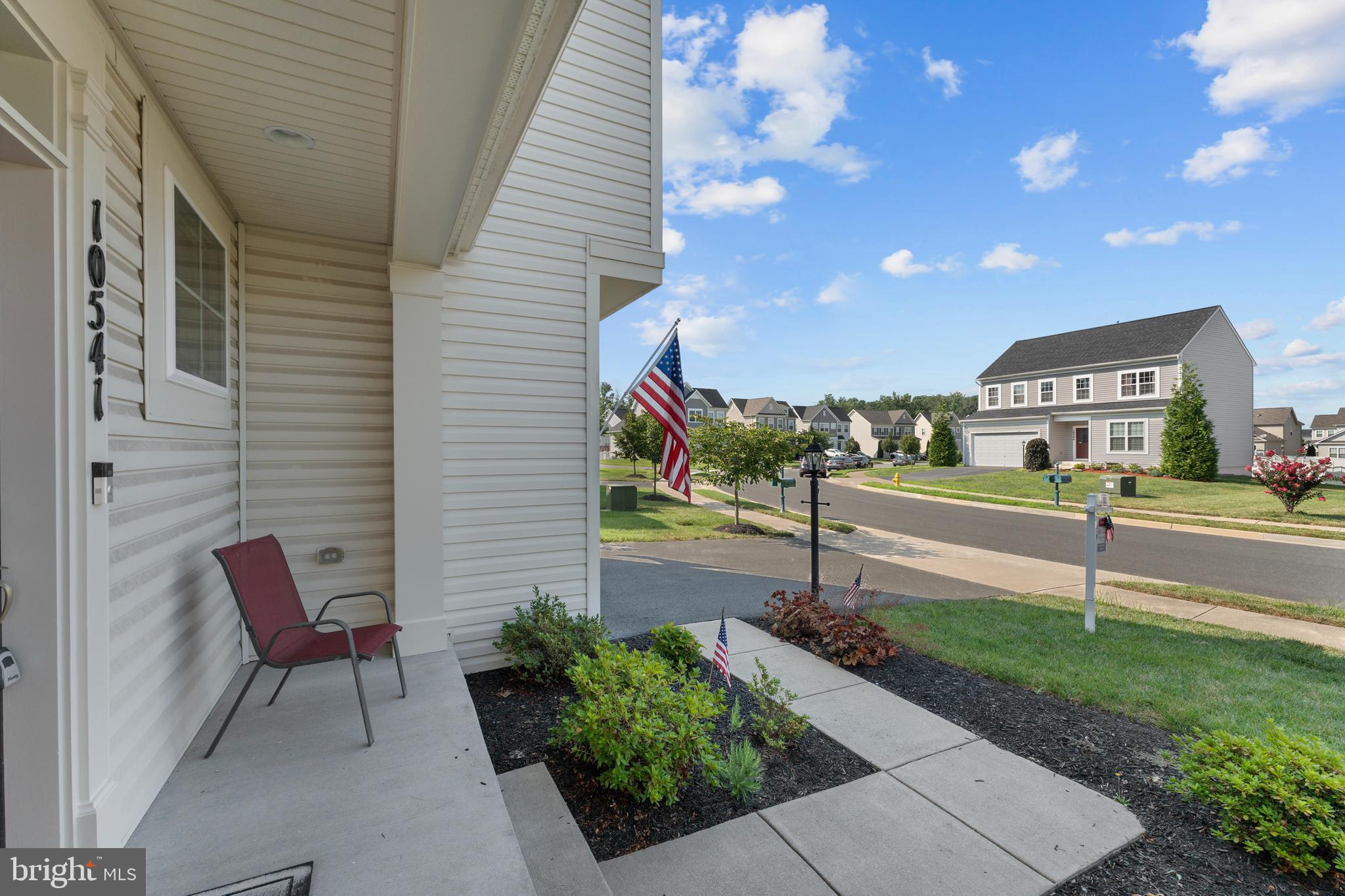 10541 Blazing Star Loop Bristow, VA 20136 - Photo 5 of 41 a view of a street with sitting area