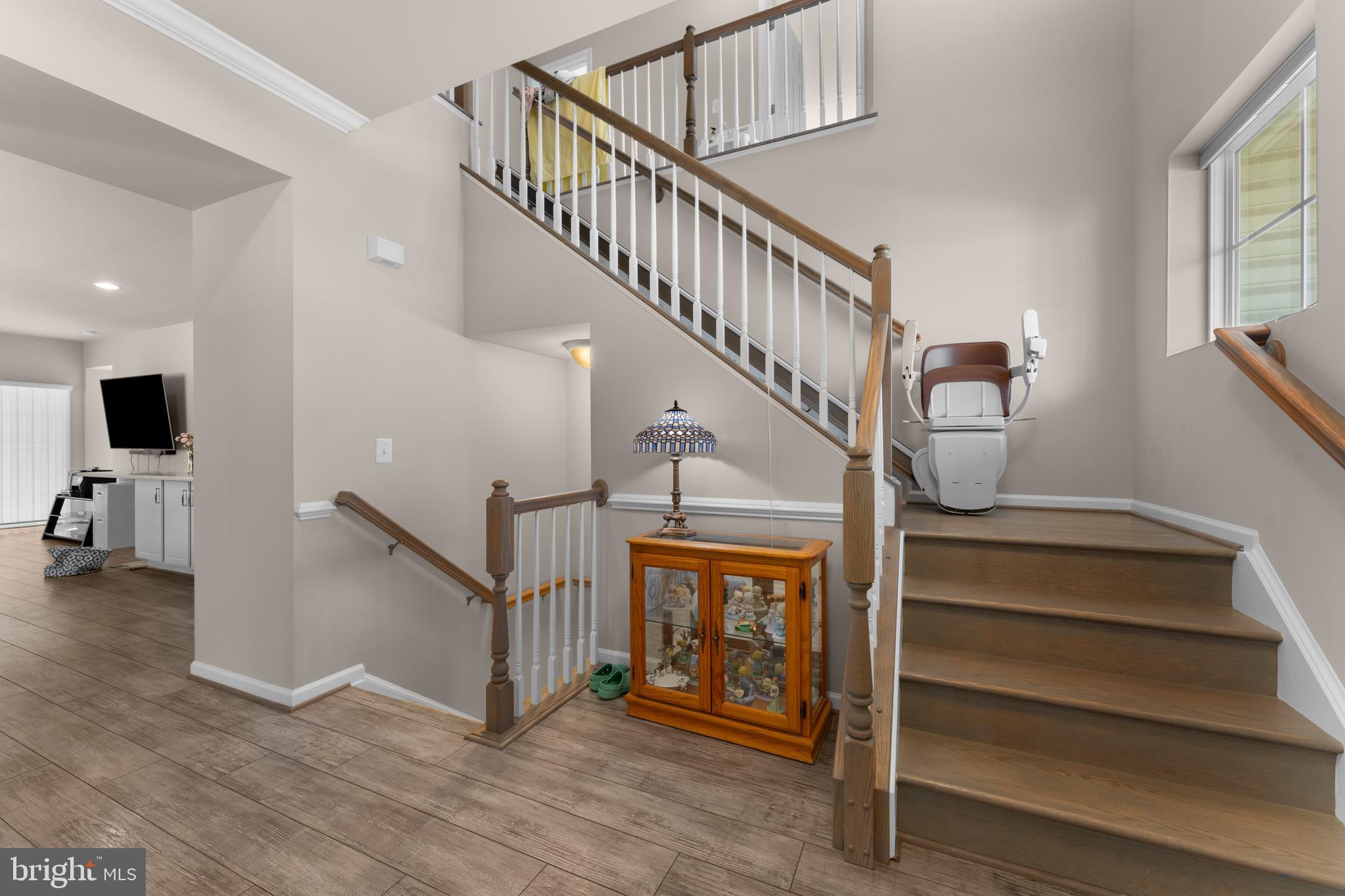 10541 Blazing Star Loop Bristow, VA 20136 - Photo 7 of 41 a view of entryway and hall with wooden floor