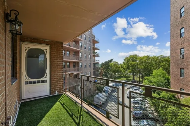 a view of balcony with furniture