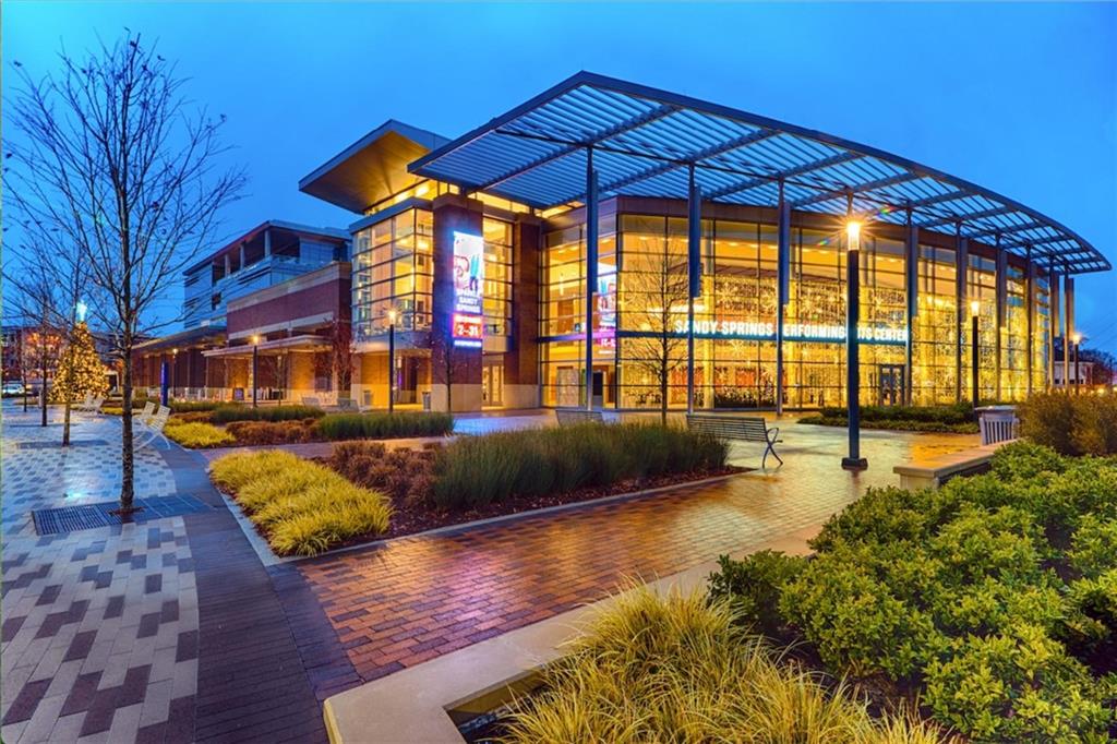 318 Sandy Springs Circle, Unit 250 Sandy Springs, GA 30328 - Photo 12 of 27 a view of swimming pool with seating space and trees in the background