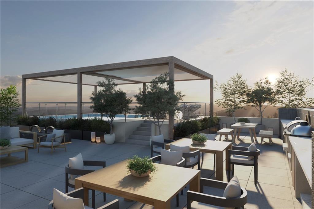 318 Sandy Springs Circle, Unit 250 Sandy Springs, GA 30328 - Photo 2 of 27 a living room with furniture and a large window