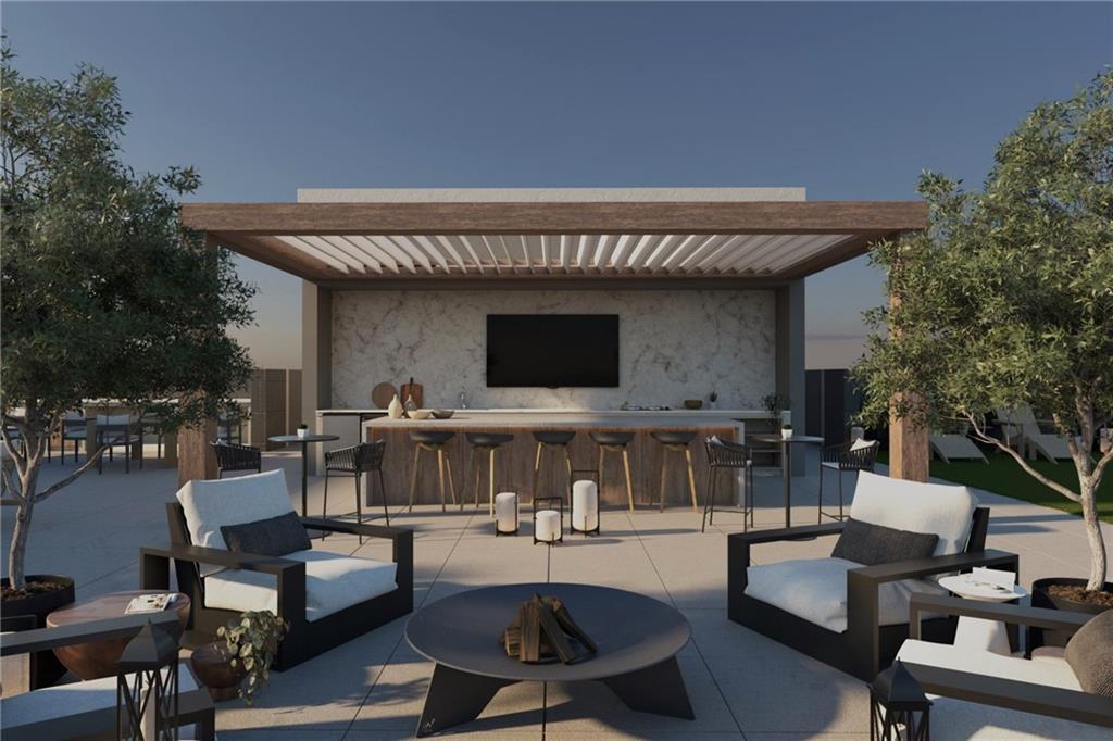 318 Sandy Springs Circle, Unit 250 Sandy Springs, GA 30328 - Photo 3 of 27 a view of a house with swimming pool and furniture