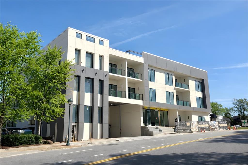 318 Sandy Springs Circle, Unit 250 Atlanta, GA 30328 - Photo 9 of 27 a front view of a building with street view