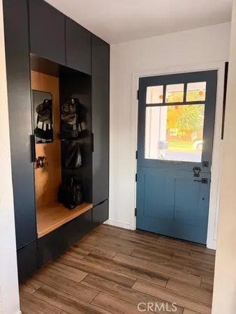 a view of a bedroom from a hallway