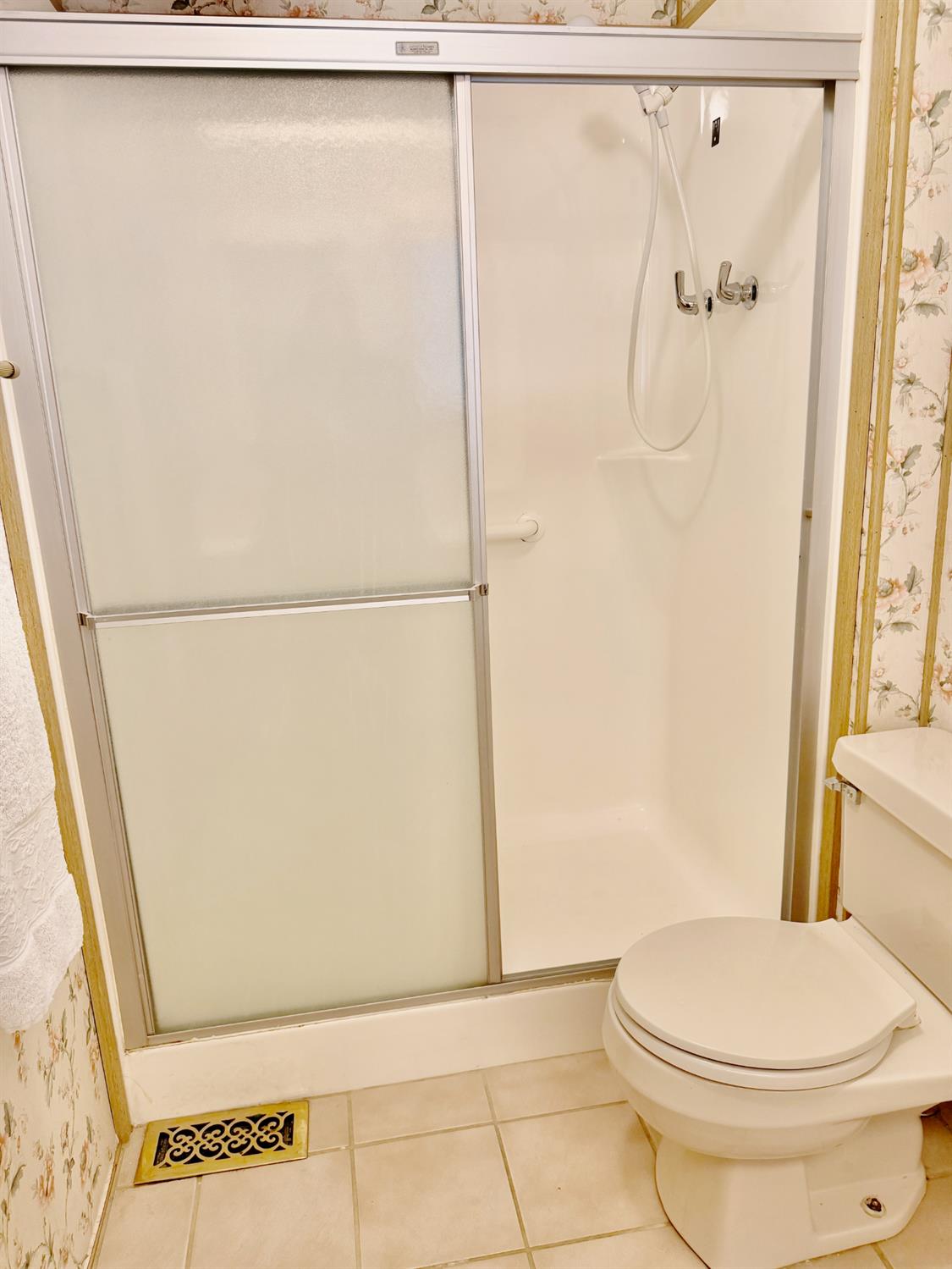 68 Yefim Roseville, CA 95661 - Photo 14 of 35 a bathroom with a toilet and a shower