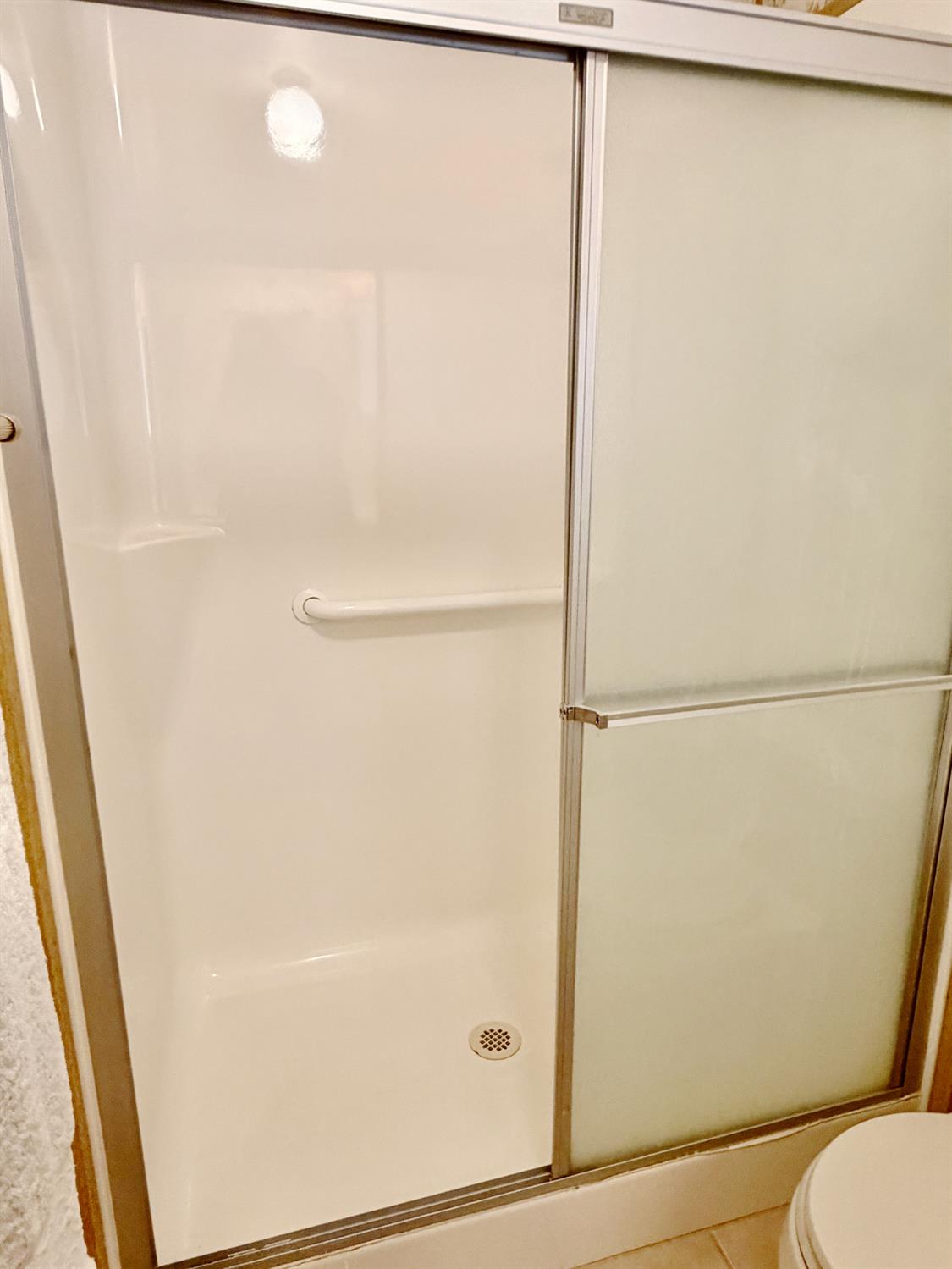 68 Yefim Roseville, CA 95661 - Photo 15 of 35 a bathroom with a shower