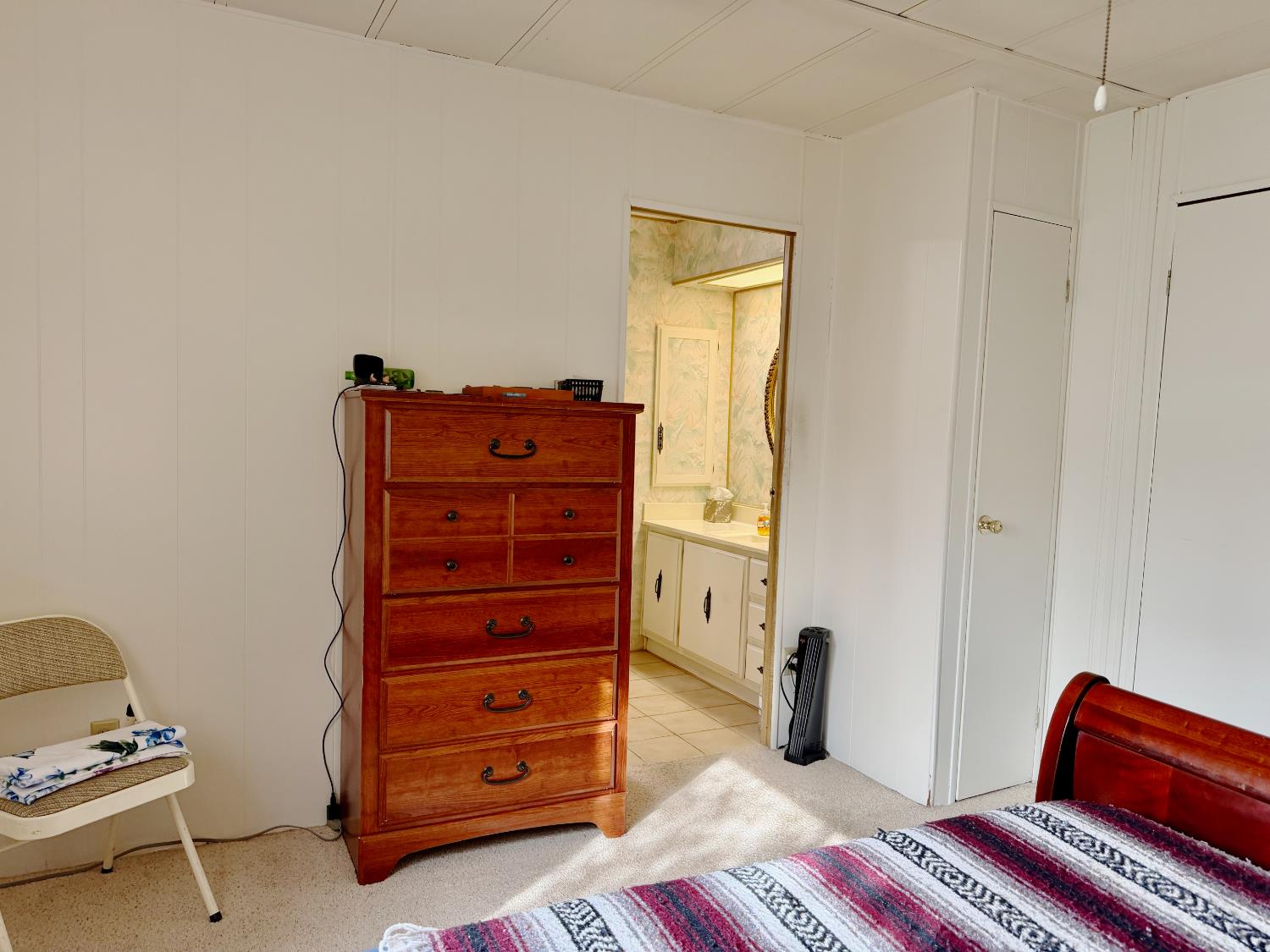 68 Yefim Roseville, CA 95661 - Photo 17 of 35 a bedroom with a bed and cabinets