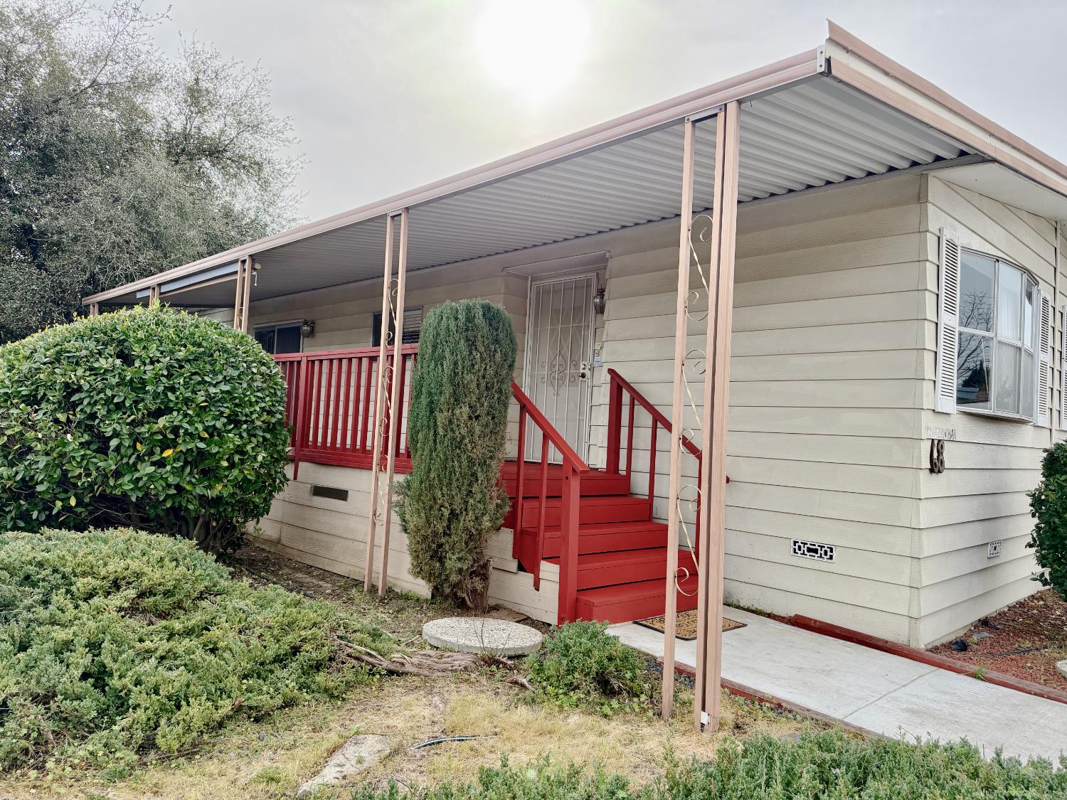 68 Yefim Roseville, CA 95661 - Photo 2 of 35 a view of a house with a small yard and wooden fence