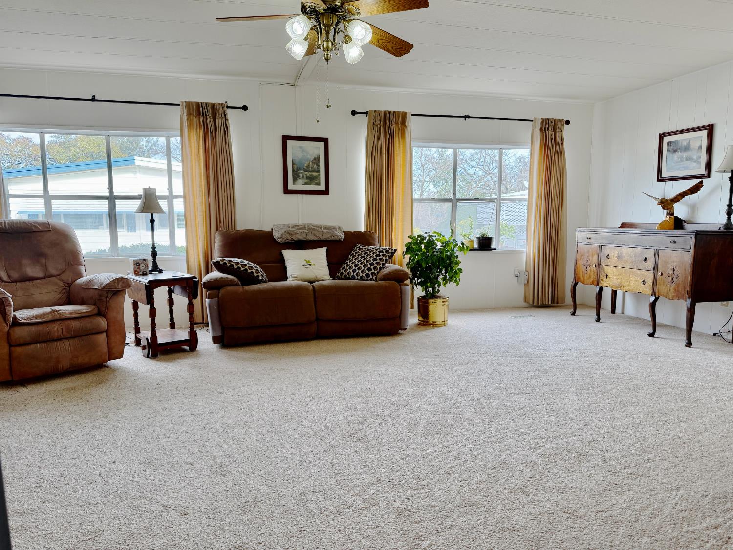 68 Yefim Roseville, CA 95661 - Photo 4 of 35 a living room with furniture and large windows