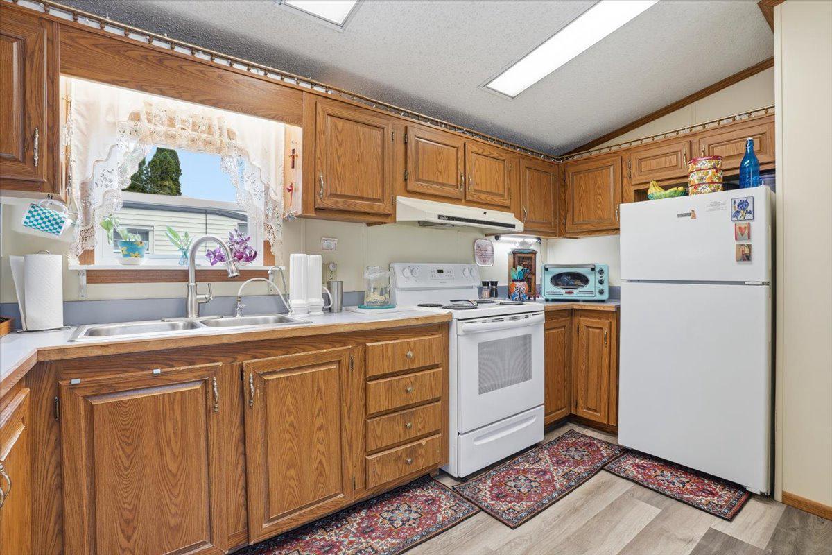 3350 Airport Road, Unit 5 Allentown, PA 18109 - Photo 19 of 53 Cozy kitchen with warm wood tones.