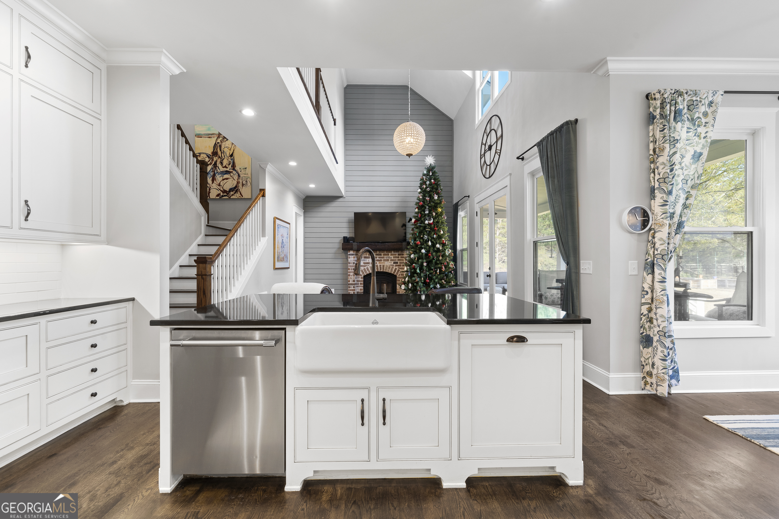 855 Jasper Street Madison, GA 30650 - Photo 14 of 46 a view of living room with furniture and wooden floor