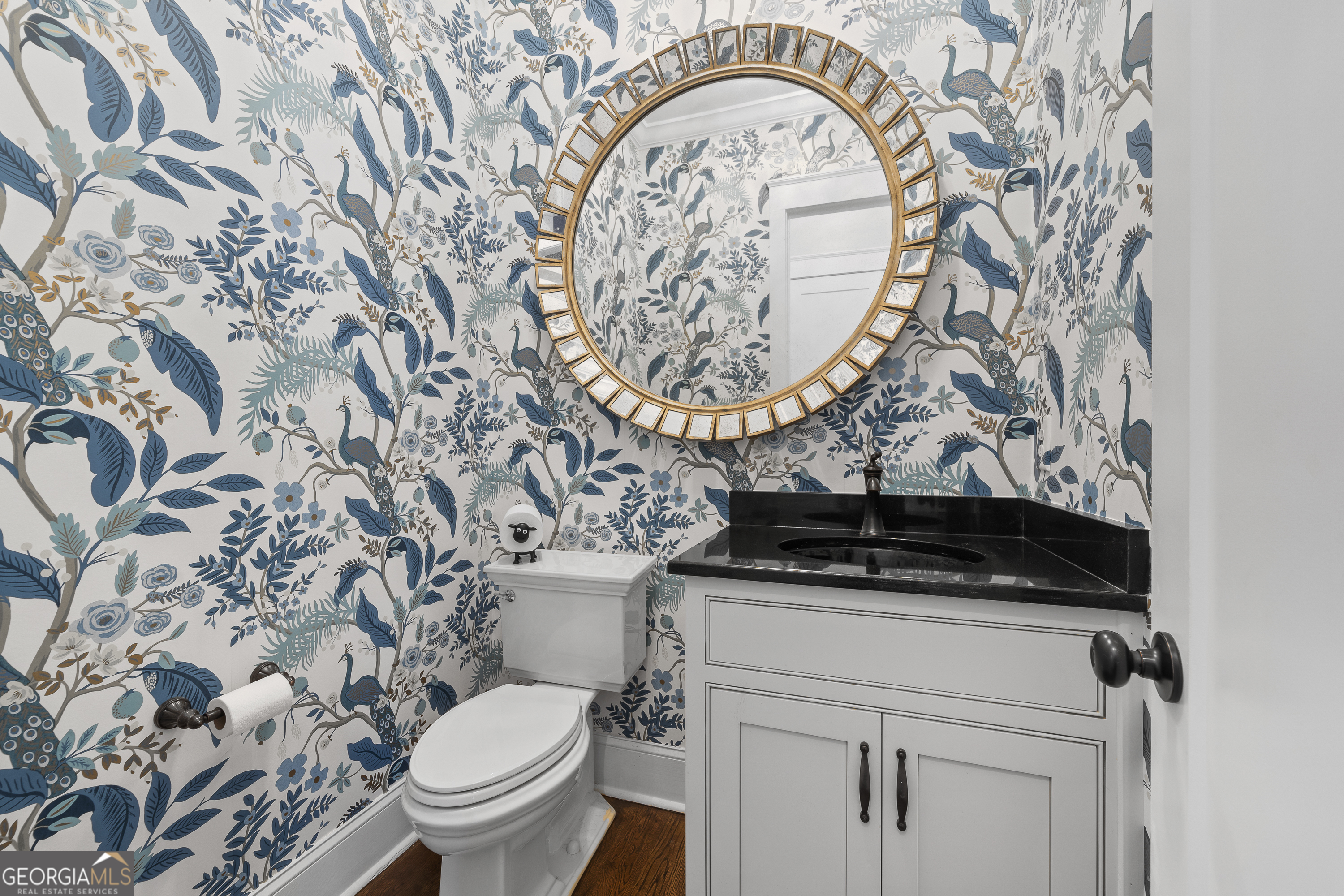 855 Jasper Street Madison, GA 30650 - Photo 27 of 46 a bathroom with a stove and a toilet