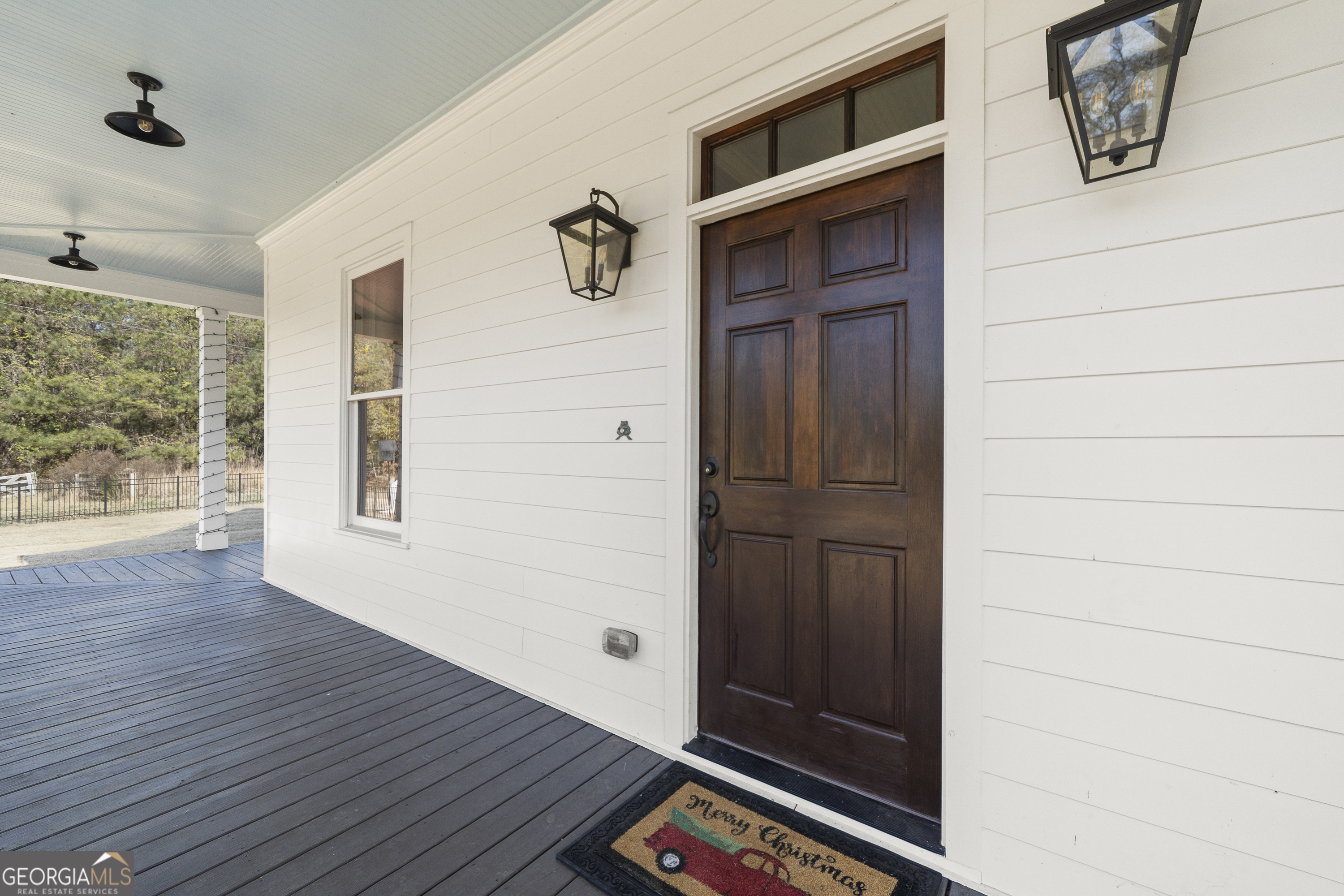 855 Jasper Street Madison, GA 30650 - Photo 3 of 46 a view of an entryway door