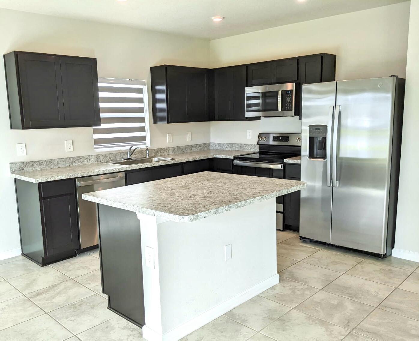 604 Lychee Lane Fort Pierce, FL 34981 - Photo 6 of 26 IMG_20251201_135123