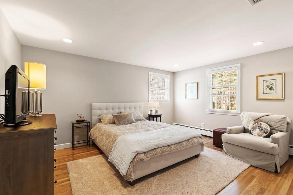 70 Windsor Road Needham, MA 02492 - Photo 21 of 35 a bedroom with a bed and a couch