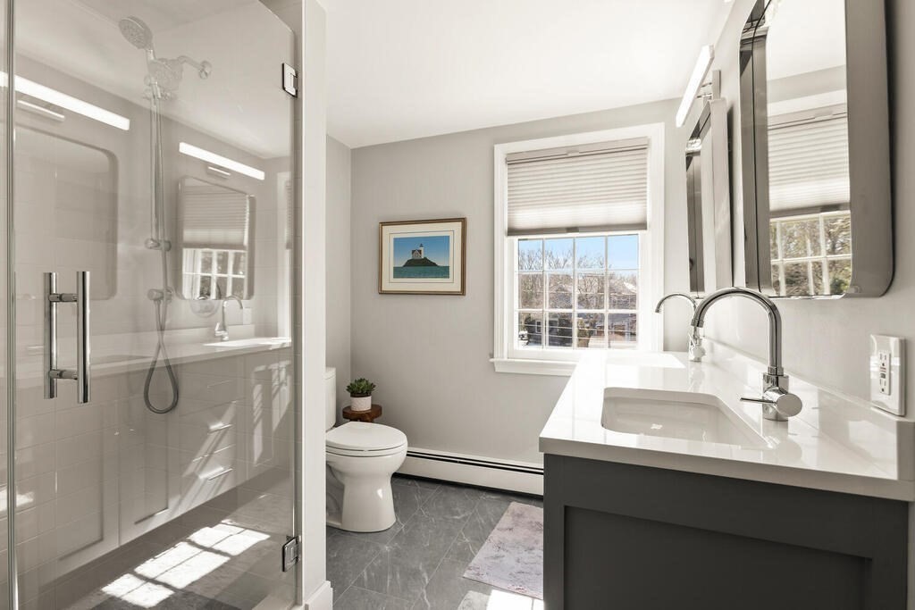 70 Windsor Road Needham, MA 02492 - Photo 22 of 35 a bathroom with a sink toilet and shower