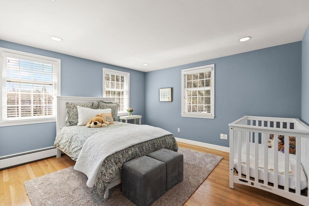 70 Windsor Road Needham, MA 02492 - Photo 23 of 35 a bedroom with a bed and a window
