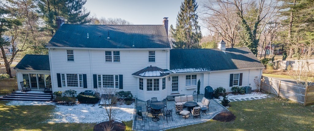 70 Windsor Road Needham, MA 02492 - Photo 3 of 35 a front view of house with yard and trees in the background