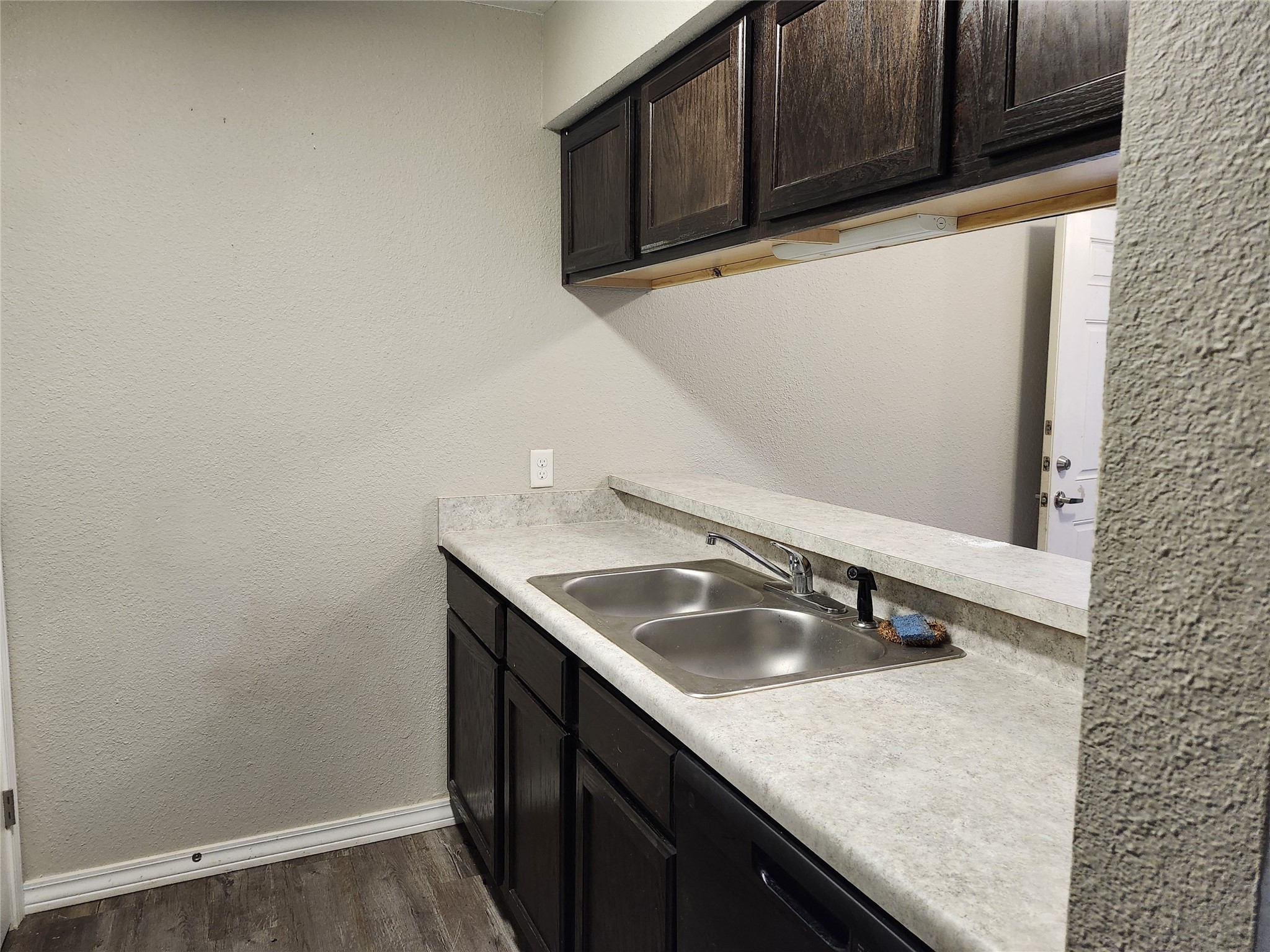 1000 South 8th Street Buckholts, TX 76518 - Photo 12 of 13 a kitchen with a sink and cabinets