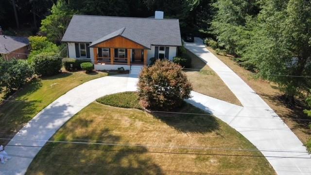 a view of a house with a yard