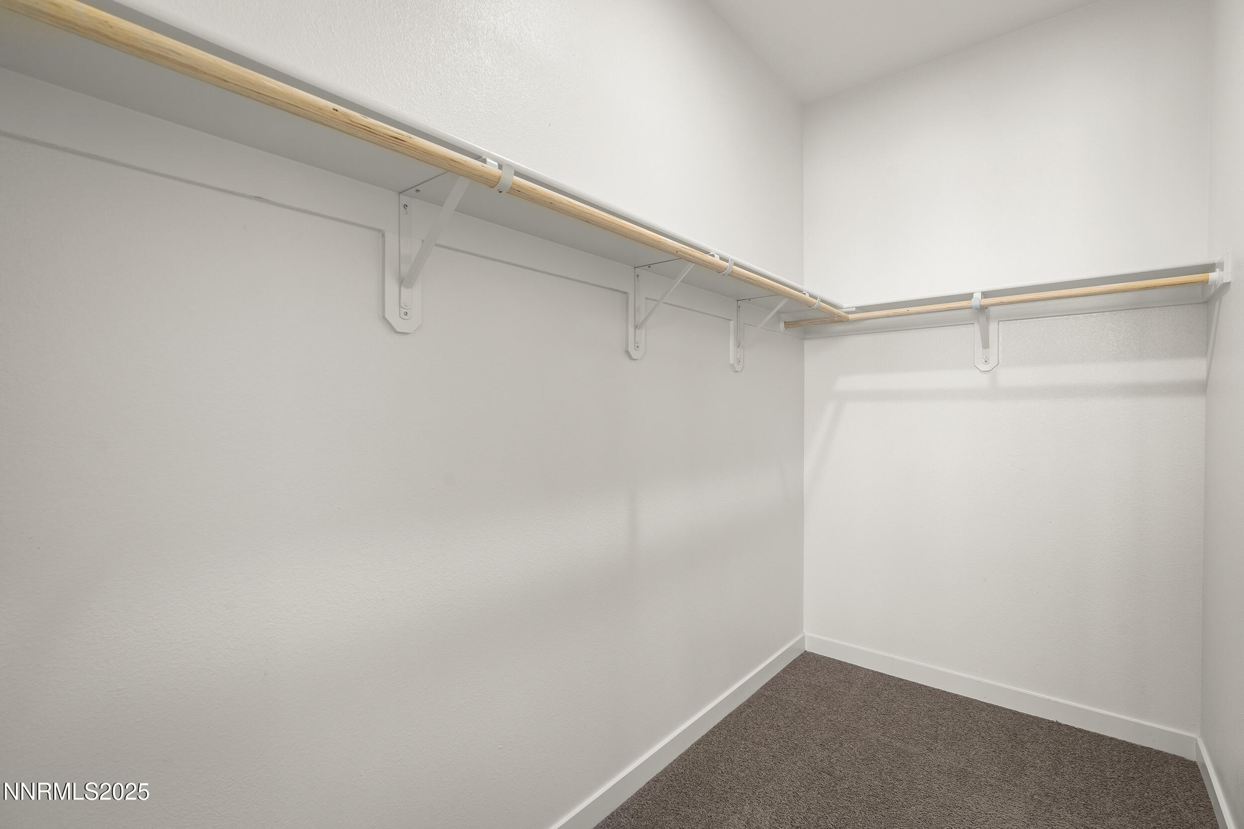 5013 Cavestone Road Sun Valley, NV 89433 - Photo 17 of 21 a view of a room with shelf