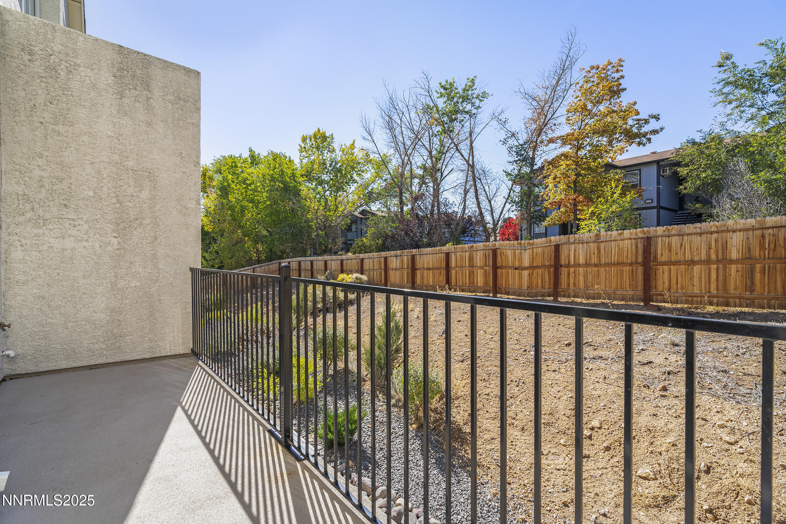 5013 Cavestone Road Sun Valley, NV 89433 - Photo 7 of 21 a view of balcony with small garden