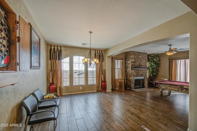 a kitchen with stainless steel appliances granite countertop a sink and cabinets
