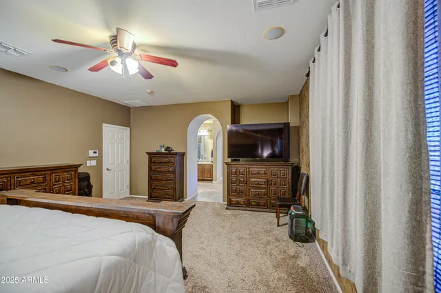 a view of a workspace with furniture