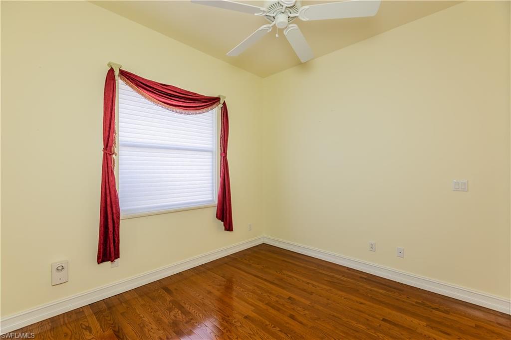 7025 Kiwi Place Naples, FL 34113 - Photo 13 of 28 a view of room with a window and closet