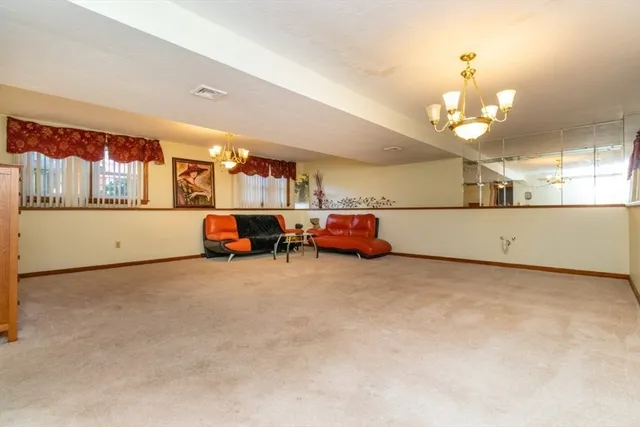 a view of a livingroom with furniture and a couch