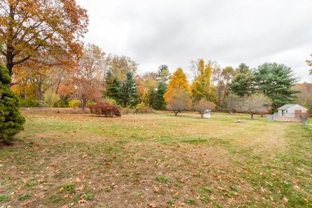 a view of a ocean with a building in the background