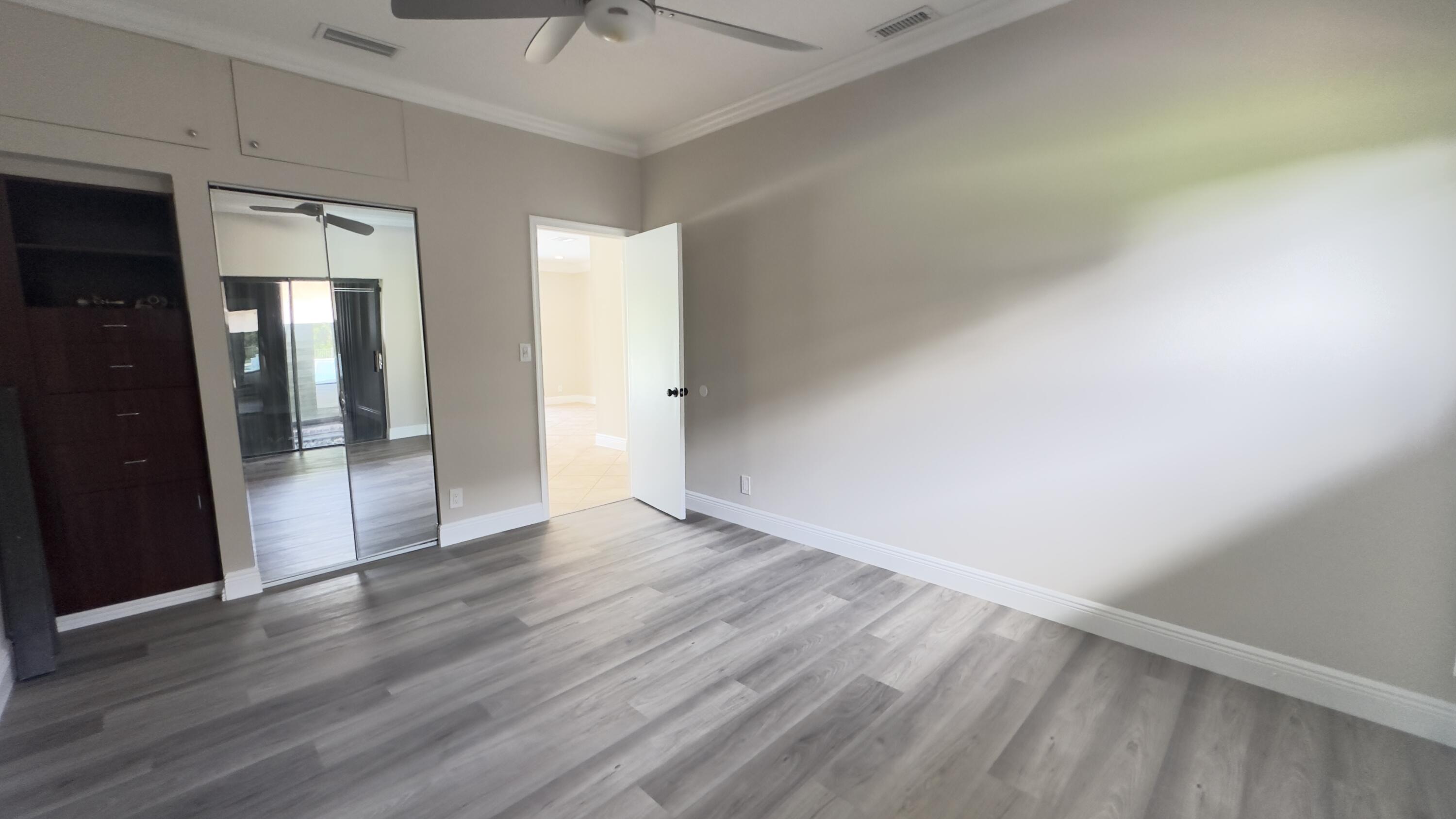 11330 Timber Lodge Terrace Boca Raton, FL 33428 - Photo 11 of 23 a view of an empty room and glass door