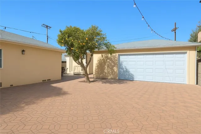 a view of garage and yard