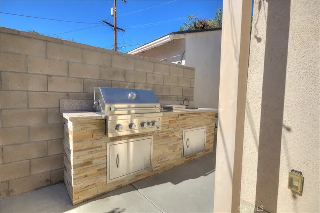 a bathroom with a shower and a sink