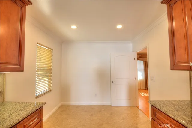 a view of kitchen and utility room